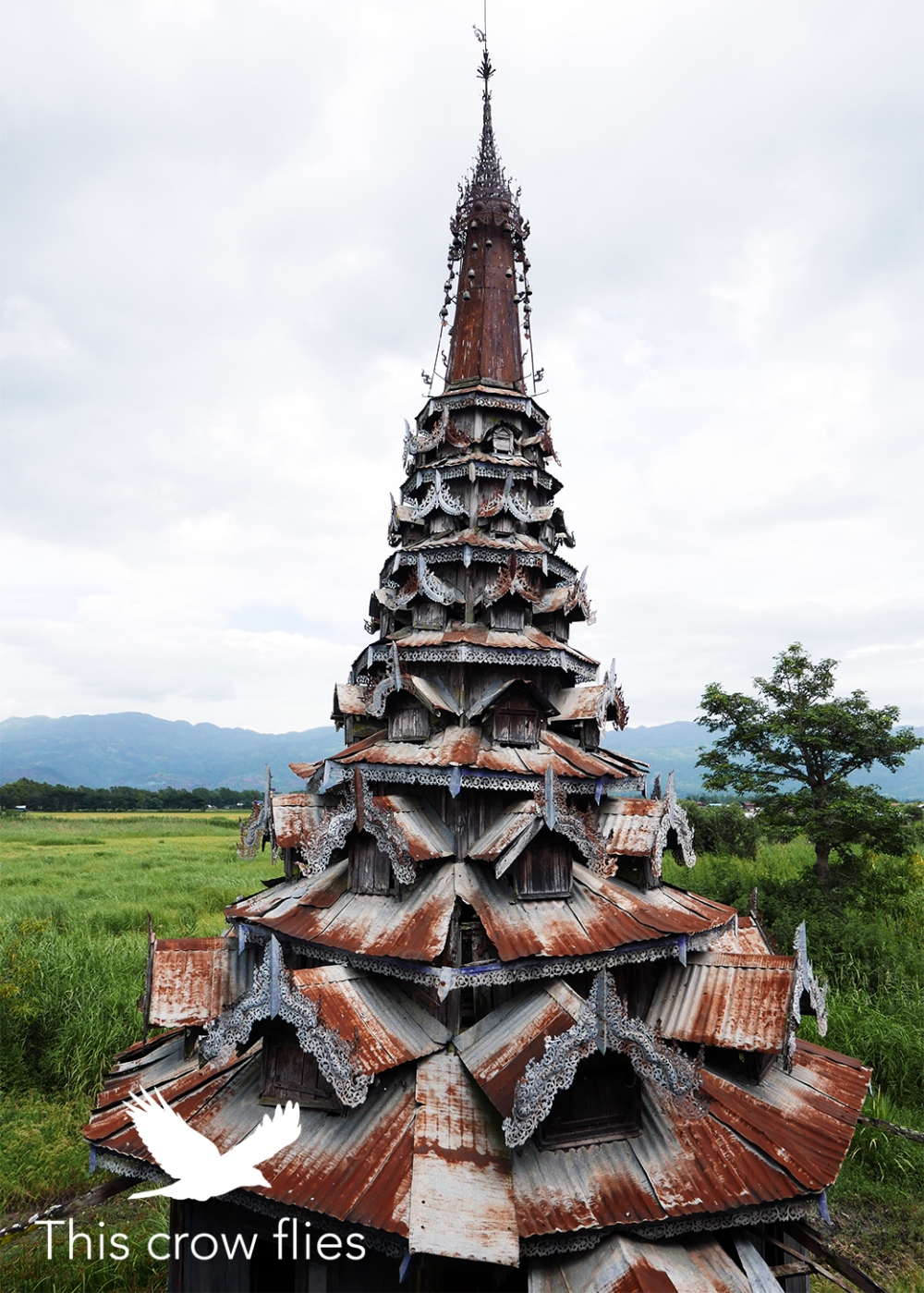 corrugated iron temple in a field